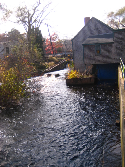A section of the Jones River in Kingston, Massachusetts, showing a fish ladder and the Kingston Water Department building